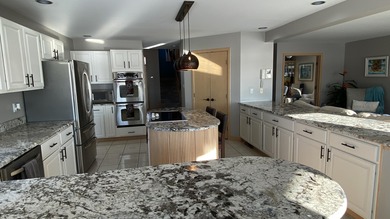 Rare opportunity to own a luxury lakefront home in the private on Lakes of the Four Seasons Country Club in Indiana - for sale on GolfHomes.com, golf home, golf lot