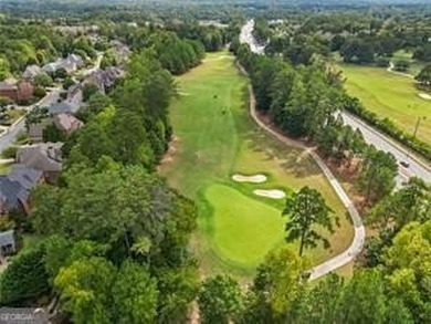 Located in the desirable Overlook at Marietta Country Club on Marietta Country Club in Georgia - for sale on GolfHomes.com, golf home, golf lot