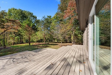 Welcome to this beautifully renovated cedar-sided Cape Cod on The Trail At Chickasaw Pointe in South Carolina - for sale on GolfHomes.com, golf home, golf lot