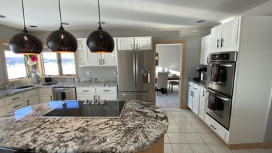 Rare opportunity to own a luxury lakefront home in the private on Lakes of the Four Seasons Country Club in Indiana - for sale on GolfHomes.com, golf home, golf lot