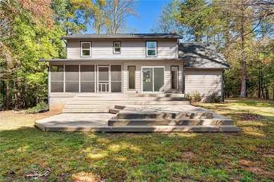 Welcome to this beautifully renovated cedar-sided Cape Cod on The Trail At Chickasaw Pointe in South Carolina - for sale on GolfHomes.com, golf home, golf lot