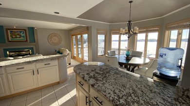 Rare opportunity to own a luxury lakefront home in the private on Lakes of the Four Seasons Country Club in Indiana - for sale on GolfHomes.com, golf home, golf lot