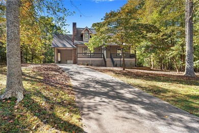 Welcome to this beautifully renovated cedar-sided Cape Cod on The Trail At Chickasaw Pointe in South Carolina - for sale on GolfHomes.com, golf home, golf lot