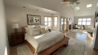 Rare opportunity to own a luxury lakefront home in the private on Lakes of the Four Seasons Country Club in Indiana - for sale on GolfHomes.com, golf home, golf lot