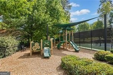 Located in the desirable Overlook at Marietta Country Club on Marietta Country Club in Georgia - for sale on GolfHomes.com, golf home, golf lot