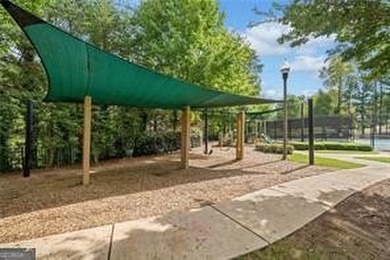 Located in the desirable Overlook at Marietta Country Club on Marietta Country Club in Georgia - for sale on GolfHomes.com, golf home, golf lot