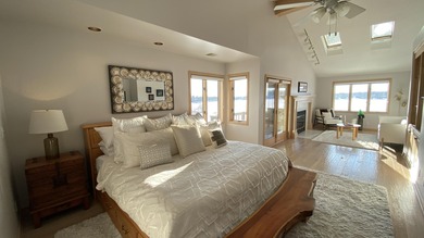 Rare opportunity to own a luxury lakefront home in the private on Lakes of the Four Seasons Country Club in Indiana - for sale on GolfHomes.com, golf home, golf lot