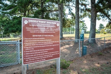 Welcome to this beautifully renovated cedar-sided Cape Cod on The Trail At Chickasaw Pointe in South Carolina - for sale on GolfHomes.com, golf home, golf lot