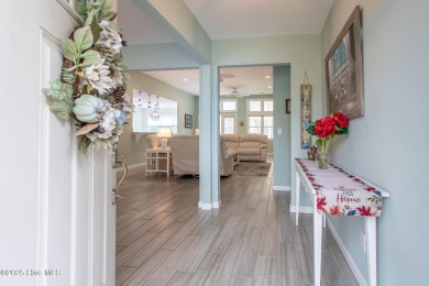 This gorgeous 3-bedroom, 2-bath home is located in The Albemarle on Sound Golf Links at Albemarle Plantation in North Carolina - for sale on GolfHomes.com, golf home, golf lot