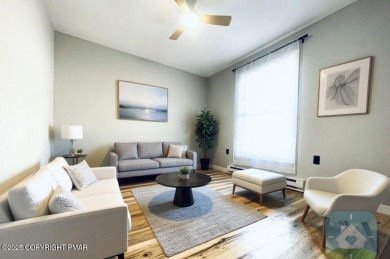 This MODERN, FULLY RENOVATED Colonial-Style Home with three on Pocono Farms Country Club in Pennsylvania - for sale on GolfHomes.com, golf home, golf lot