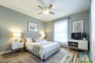 This MODERN, FULLY RENOVATED Colonial-Style Home with three on Pocono Farms Country Club in Pennsylvania - for sale on GolfHomes.com, golf home, golf lot