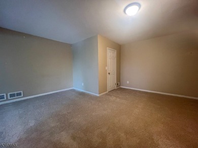 Discover this impressive end unit offers a generous 1,496 square on Minerals Golf Club in New Jersey - for sale on GolfHomes.com, golf home, golf lot