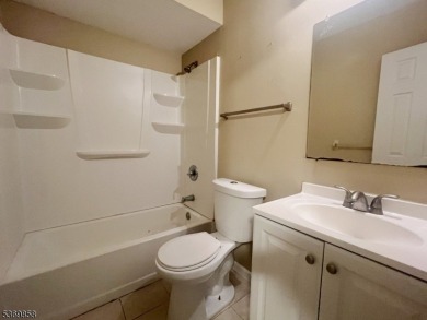 Discover this impressive end unit offers a generous 1,496 square on Minerals Golf Club in New Jersey - for sale on GolfHomes.com, golf home, golf lot
