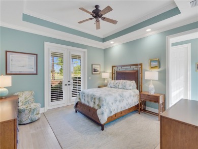 This courtyard pool home is nestled on a lush golf course on Indian River Club in Florida - for sale on GolfHomes.com, golf home, golf lot