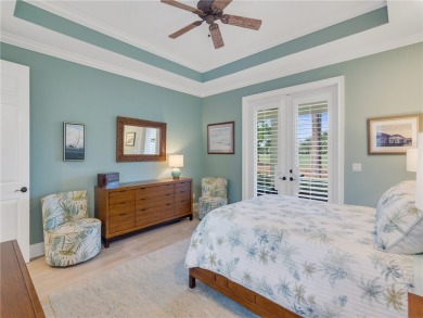 This courtyard pool home is nestled on a lush golf course on Indian River Club in Florida - for sale on GolfHomes.com, golf home, golf lot