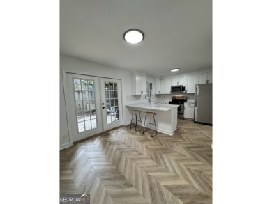 102 Adrian Place is a rare, walk-up townhome opportunity sited on Cross Creek Golf Course in Georgia - for sale on GolfHomes.com, golf home, golf lot