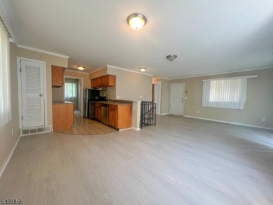 Discover this impressive end unit offers a generous 1,496 square on Minerals Golf Club in New Jersey - for sale on GolfHomes.com, golf home, golf lot