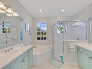 This courtyard pool home is nestled on a lush golf course on Indian River Club in Florida - for sale on GolfHomes.com, golf home, golf lot