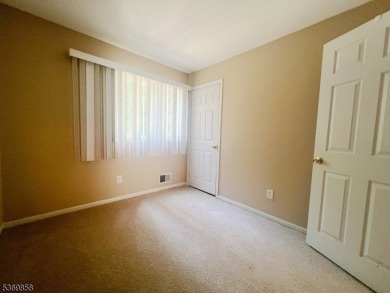 Discover this impressive end unit offers a generous 1,496 square on Minerals Golf Club in New Jersey - for sale on GolfHomes.com, golf home, golf lot