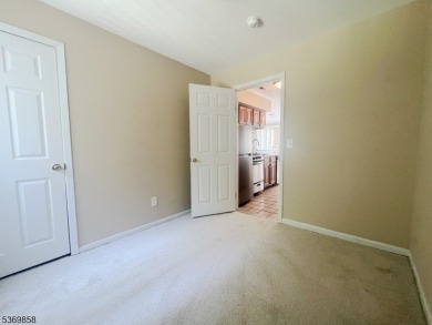 Discover this impressive end unit offers a generous 1,496 square on Minerals Golf Club in New Jersey - for sale on GolfHomes.com, golf home, golf lot