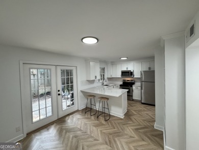 102 Adrian Place is a rare, walk-up townhome opportunity sited on Cross Creek Golf Course in Georgia - for sale on GolfHomes.com, golf home, golf lot