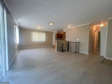 Discover this impressive end unit offers a generous 1,496 square on Minerals Golf Club in New Jersey - for sale on GolfHomes.com, golf home, golf lot