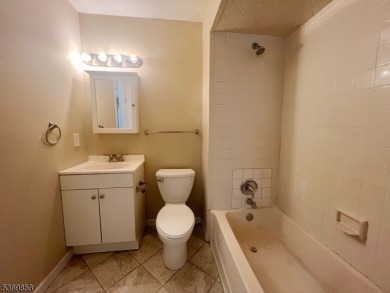Discover this impressive end unit offers a generous 1,496 square on Minerals Golf Club in New Jersey - for sale on GolfHomes.com, golf home, golf lot