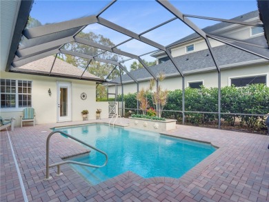 This courtyard pool home is nestled on a lush golf course on Indian River Club in Florida - for sale on GolfHomes.com, golf home, golf lot