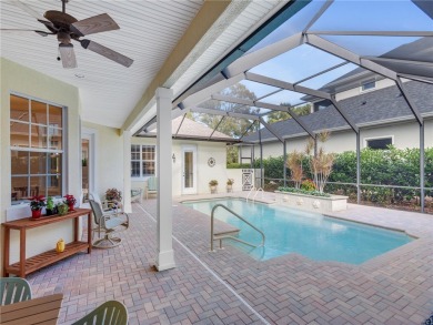 This courtyard pool home is nestled on a lush golf course on Indian River Club in Florida - for sale on GolfHomes.com, golf home, golf lot