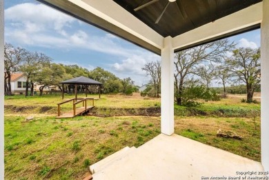 Welcome to this stunning fully-furnished residence nestled in on Vaaler Creek Golf Club in Texas - for sale on GolfHomes.com, golf home, golf lot