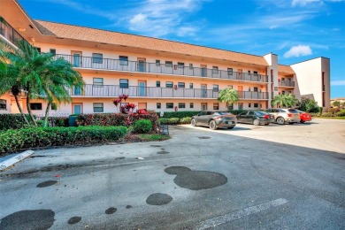 Welcome Home to this spacious unit overlooking the tranquil on Sunrise Lakes Phase IV Golf Course in Florida - for sale on GolfHomes.com, golf home, golf lot