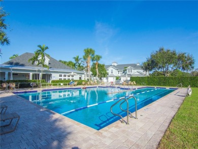 This courtyard pool home is nestled on a lush golf course on Indian River Club in Florida - for sale on GolfHomes.com, golf home, golf lot