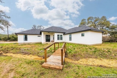 Welcome to this stunning fully-furnished residence nestled in on Vaaler Creek Golf Club in Texas - for sale on GolfHomes.com, golf home, golf lot