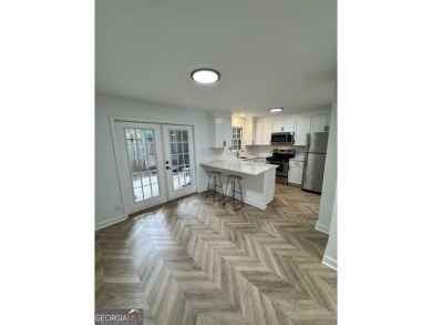 102 Adrian Place is a rare, walk-up townhome opportunity sited on Cross Creek Golf Course in Georgia - for sale on GolfHomes.com, golf home, golf lot