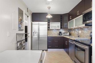 This beautifully remodeled 2-bed, 2-bth residence is located on on Palm-Aire Country Club and Resort - The Oaks in Florida - for sale on GolfHomes.com, golf home, golf lot