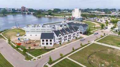 Enjoy carefree living in this spacious 2000 sq. ft. Harbor on Harbour Shores Golf Course in Michigan - for sale on GolfHomes.com, golf home, golf lot