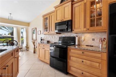 Highly sought-after SW Cape area GULF ACCESS POOL HOME! BOASTS on Royal Tee Country Club in Florida - for sale on GolfHomes.com, golf home, golf lot