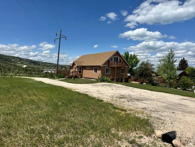 Motivated Seller!!! Are you looking for a family cabin in Bear on Bear Lake West Golf and Country Club in Idaho - for sale on GolfHomes.com, golf home, golf lot