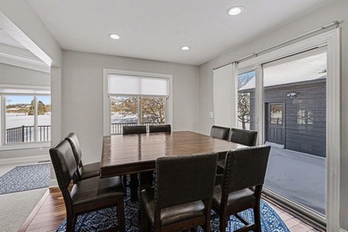 This completely updated Colonial overlooking the #12 Green at on Travis Pointe Country Club in Michigan - for sale on GolfHomes.com, golf home, golf lot