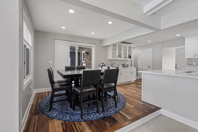 This completely updated Colonial overlooking the #12 Green at on Travis Pointe Country Club in Michigan - for sale on GolfHomes.com, golf home, golf lot