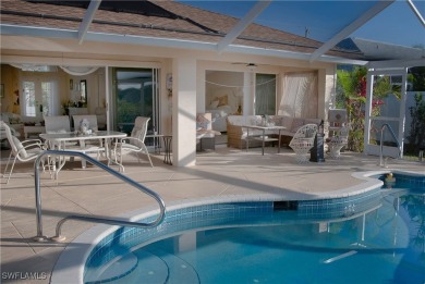 Highly sought-after SW Cape area GULF ACCESS POOL HOME! BOASTS on Royal Tee Country Club in Florida - for sale on GolfHomes.com, golf home, golf lot