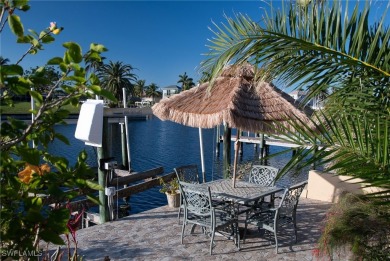 Highly sought-after SW Cape area GULF ACCESS POOL HOME! BOASTS on Royal Tee Country Club in Florida - for sale on GolfHomes.com, golf home, golf lot