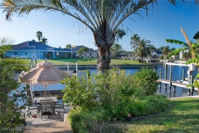 Highly sought-after SW Cape area GULF ACCESS POOL HOME! BOASTS on Royal Tee Country Club in Florida - for sale on GolfHomes.com, golf home, golf lot