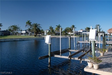Highly sought-after SW Cape area GULF ACCESS POOL HOME! BOASTS on Royal Tee Country Club in Florida - for sale on GolfHomes.com, golf home, golf lot