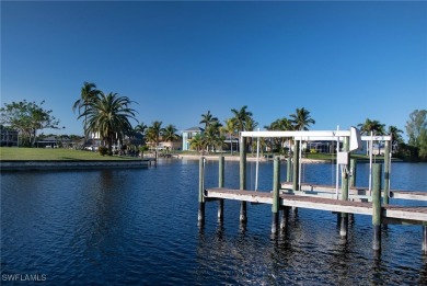 Highly sought-after SW Cape area GULF ACCESS POOL HOME! BOASTS on Royal Tee Country Club in Florida - for sale on GolfHomes.com, golf home, golf lot