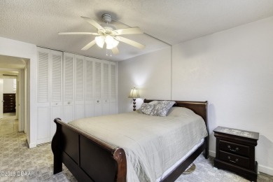 Enjoy easy living in this beautifully furnished 2-bedroom on Daytona Beach Golf Club in Florida - for sale on GolfHomes.com, golf home, golf lot