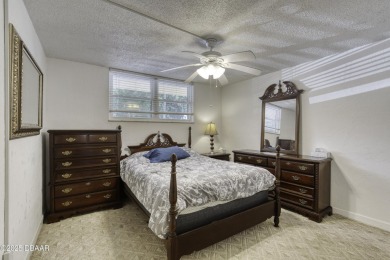 Enjoy easy living in this beautifully furnished 2-bedroom on Daytona Beach Golf Club in Florida - for sale on GolfHomes.com, golf home, golf lot