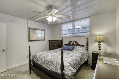 Enjoy easy living in this beautifully furnished 2-bedroom on Daytona Beach Golf Club in Florida - for sale on GolfHomes.com, golf home, golf lot