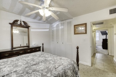 Enjoy easy living in this beautifully furnished 2-bedroom on Daytona Beach Golf Club in Florida - for sale on GolfHomes.com, golf home, golf lot
