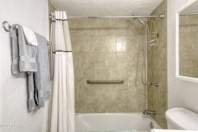 Enjoy easy living in this beautifully furnished 2-bedroom on Daytona Beach Golf Club in Florida - for sale on GolfHomes.com, golf home, golf lot